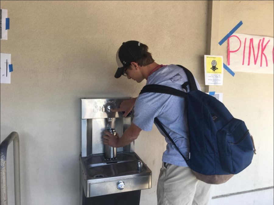 Michael Cassetti ('19) fills up his Yeti water bottle at one of the hydration stations here on campus.