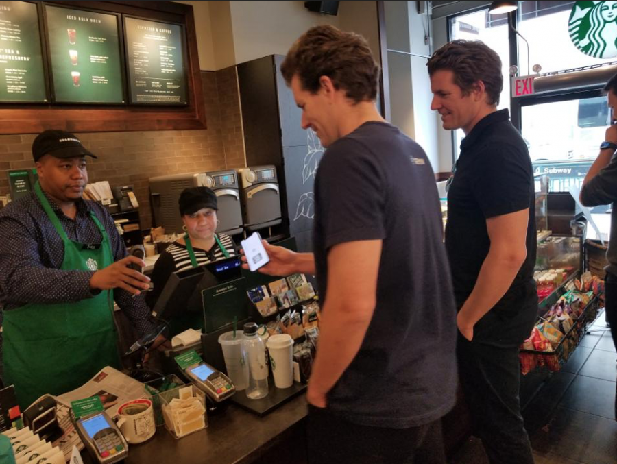 Winklevoss twins use cryptocurrency to pay for Starbucks.