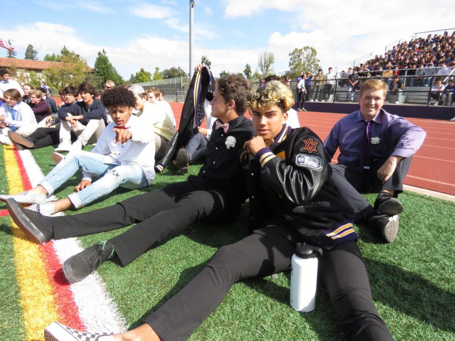 DJ Miranda, junior, poses for the camera with his fellow football fellas. 