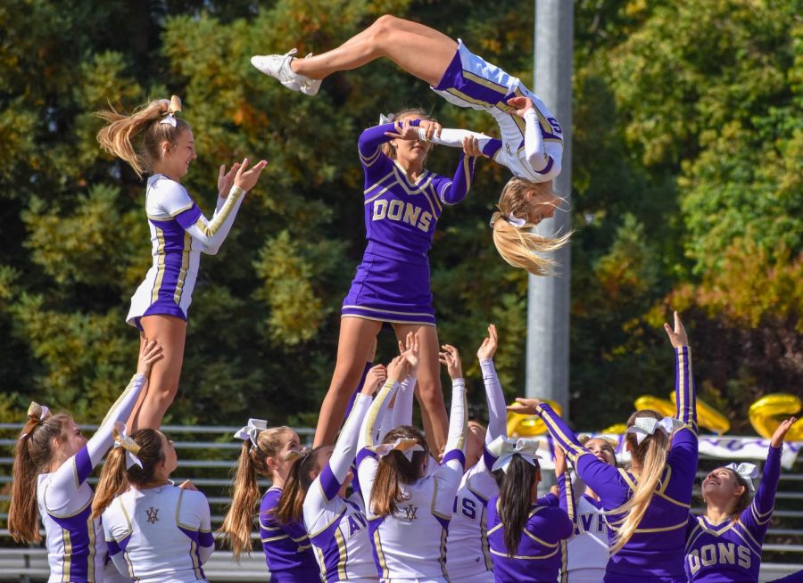 AVHS cheer performs a difficult film to impress the crowd. 