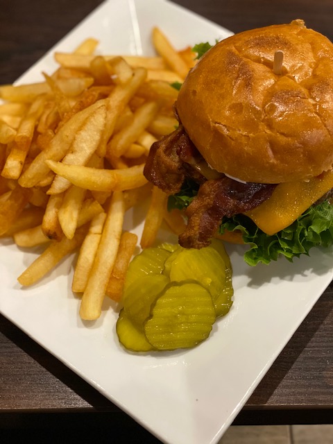 The mouthwatering Bacon-Cheeseburger with a side of fries in Pleasantons new restaurant, Patio. 