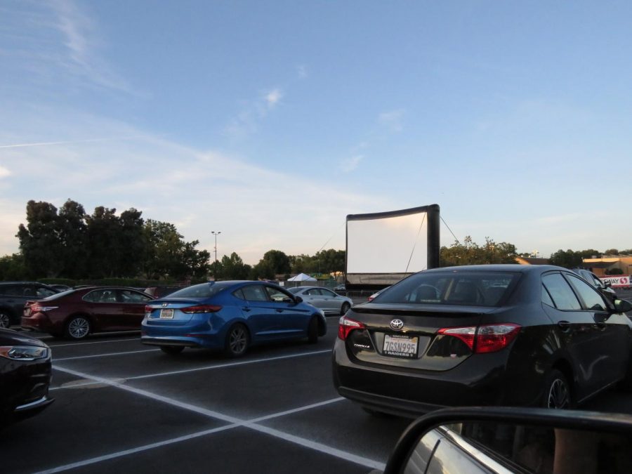 Families parked at least one parking spot away from each other to follow social distancing guidelines. 