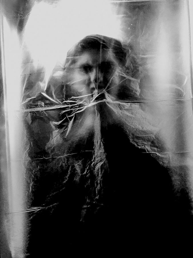 AV Senior Casey Chang describes that she first "cut open plastic bags" then "taped them together in front of her bathroom door" and finally "held a light behind her subject" to capture this spooky image for her Halloween Instagram post. 