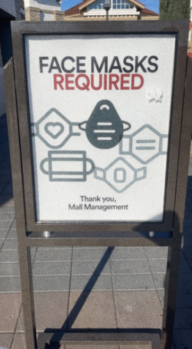 Most places of business require customers to wear masks to protect themselves and those working. This sign can be found at the Livermore Outlets, but similar signs can be found at other businesses.