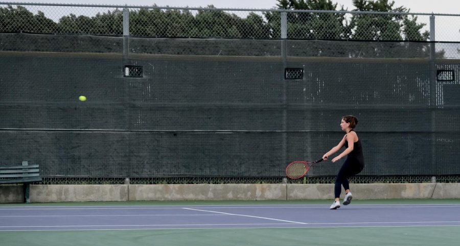 Maya Sendler ('23) makes hitting the ball look effortless as she takes on her opponent in one of her sets.
