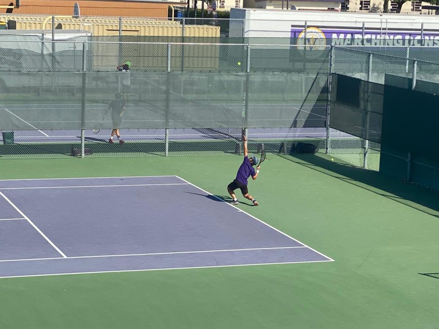 Byan Park (23) prepares for an absolute heater from his Dublin opponent in his singles match. 