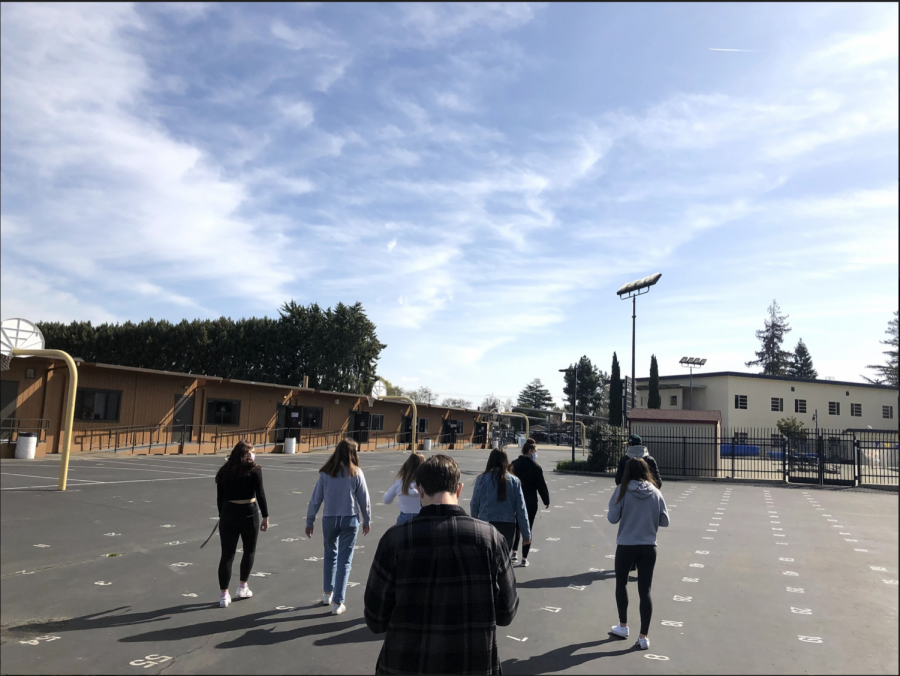 Photography students taking a walk around campus trying to find pictures to take!
