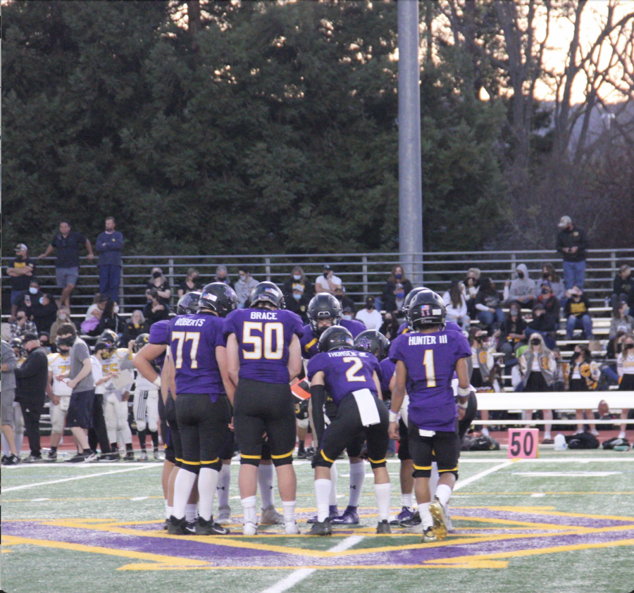 The team huddled together at their last home game of the year against Granada.