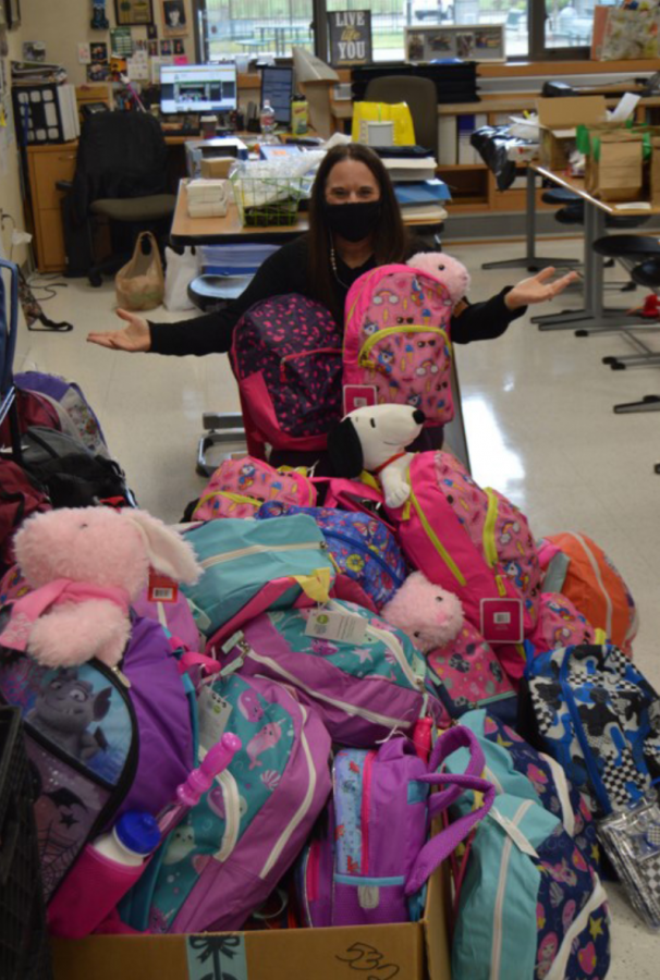 Janet+Tarsi+displays+the+backpacks+for+Chemo+Bags+of+Hope+in+her+classroom.