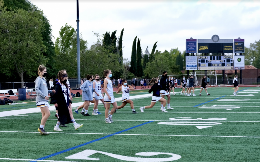  The senior girls take to the field for their last game on the Amador turf. 