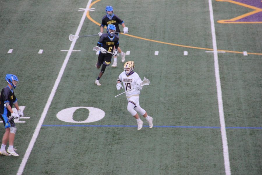 #19 Nick Strain ('21) challenges Foothill's defense solo.
