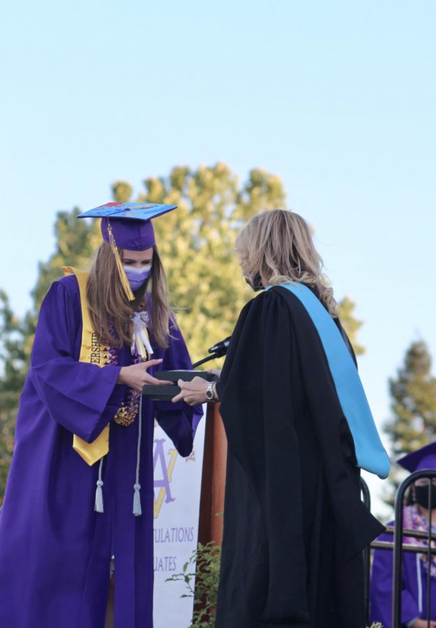 Leadership and ASB president, Megan Sloan, receives an award for all that she has contributed to the Don Community.
