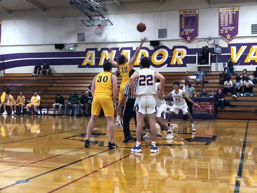 Livermore snags the ball off the tip-off. 