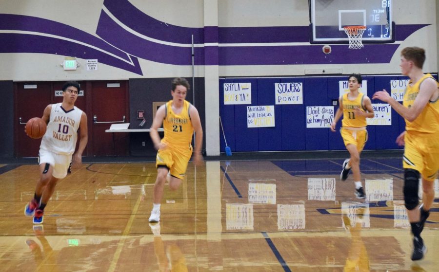 DJ Miranda ('21) drives forward on offense. 