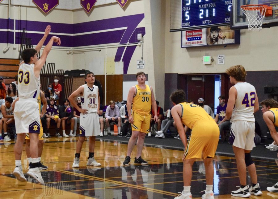 Javier Gros-Suarez (23) shoots his free throw shot. 