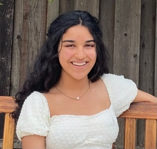 Samaira Mehta ('24) smiles, sporting her handmade dress.