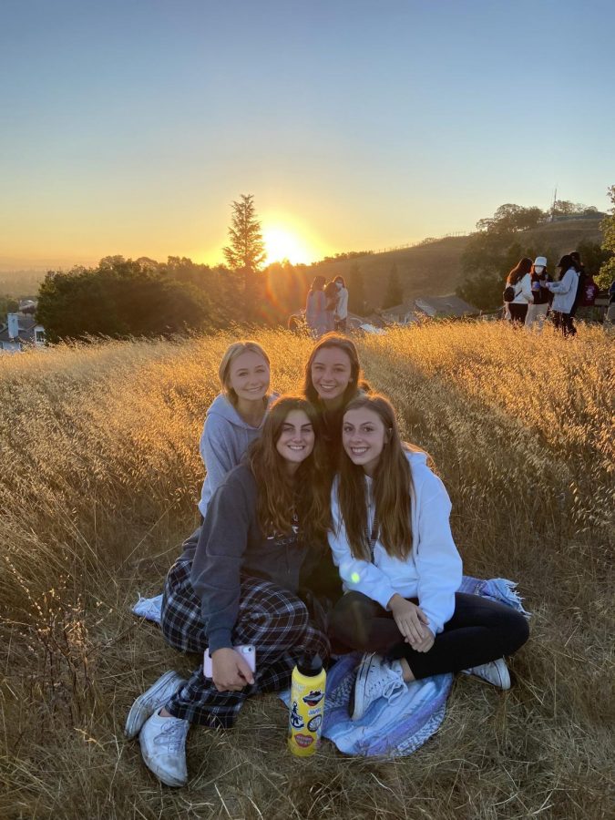 Seniors+Sarah+Carter%2C+Imogen+Rogers%2C+Ella+Hodges%2C+and+Hannah+Rohr+enjoyed+a+picture+perfect+moment+together+in+front+of+the+sunrise.