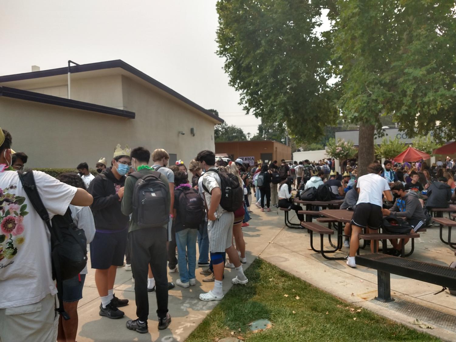 How do students maintain social distancing during lunch?