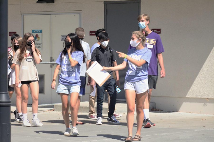 Freshman/ new students are being shown around campus by the Link Crew.