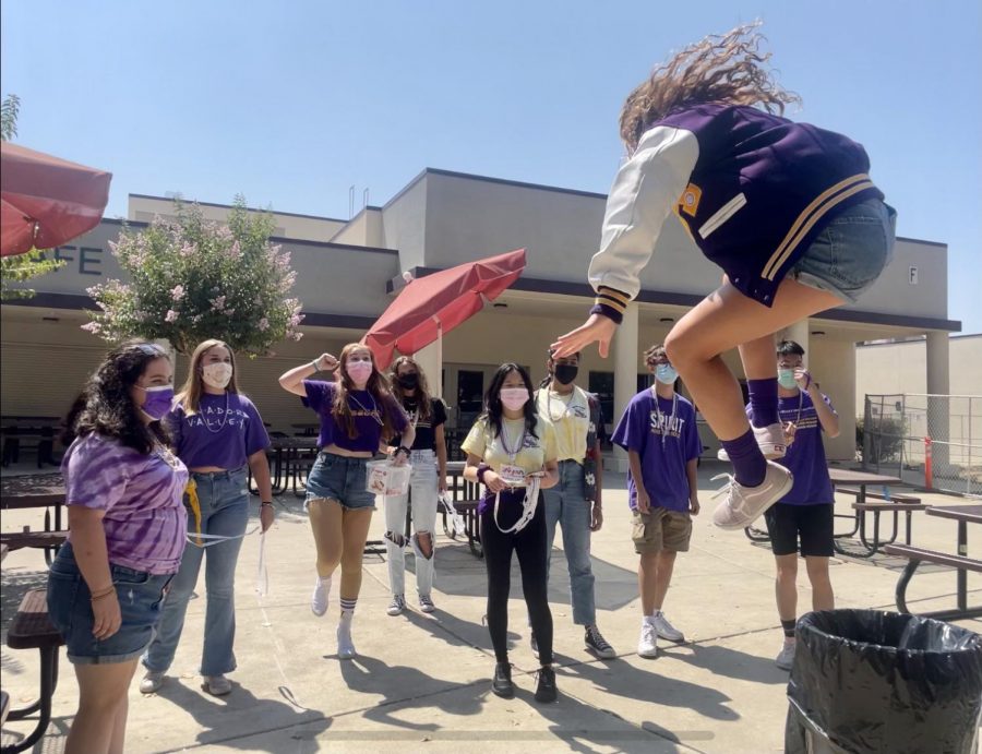 Hannah Walder (‘22) hypes the leadership group up before going into the classrooms by playing music and jumping around.