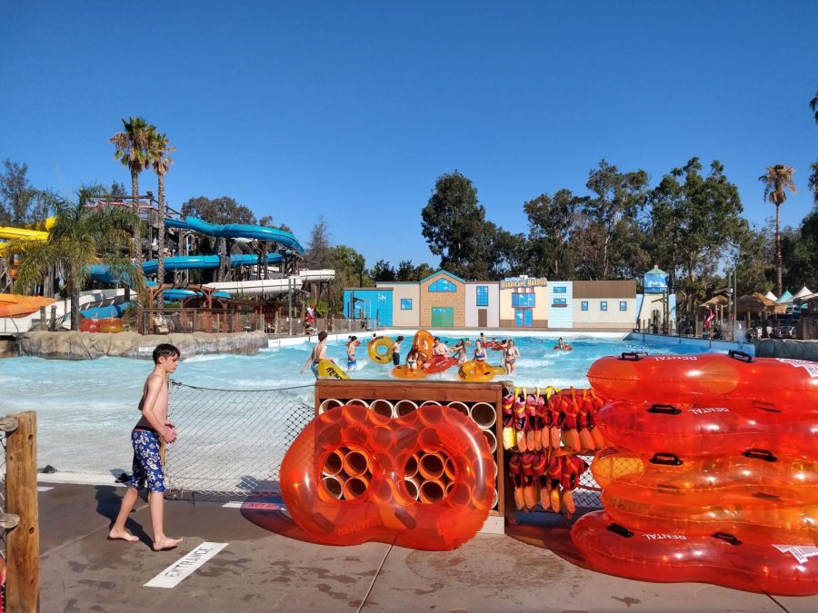 At the Breaker Beach Wave Pool, students challenge the powerful artificial waves in a pool on swimming floats. 