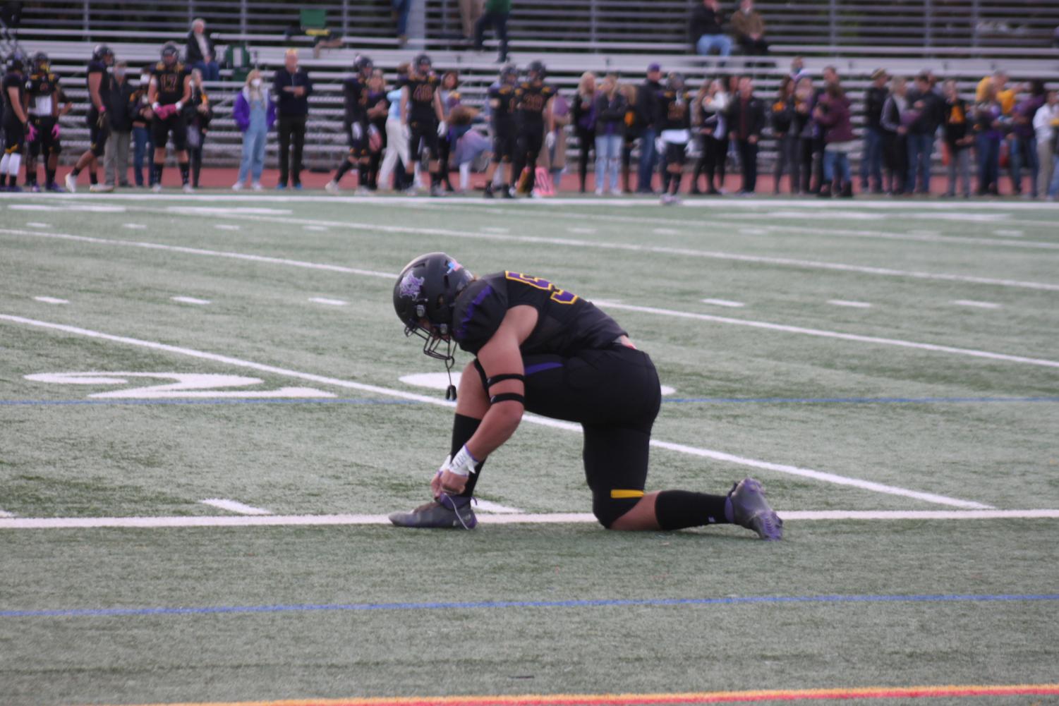 Dons raise awareness for Breast Cancer Awareness at Varsity game