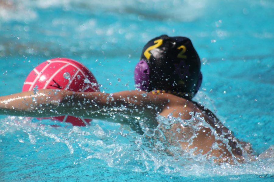 Noah Koll ('23) surges forward on offense.