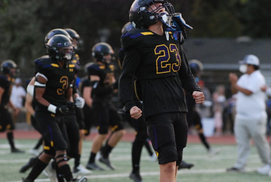 An Amador player yells at the sky in triumph.
