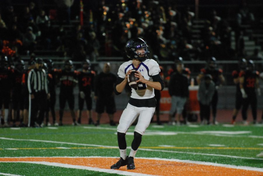 An Amador player prepares to throw the football.