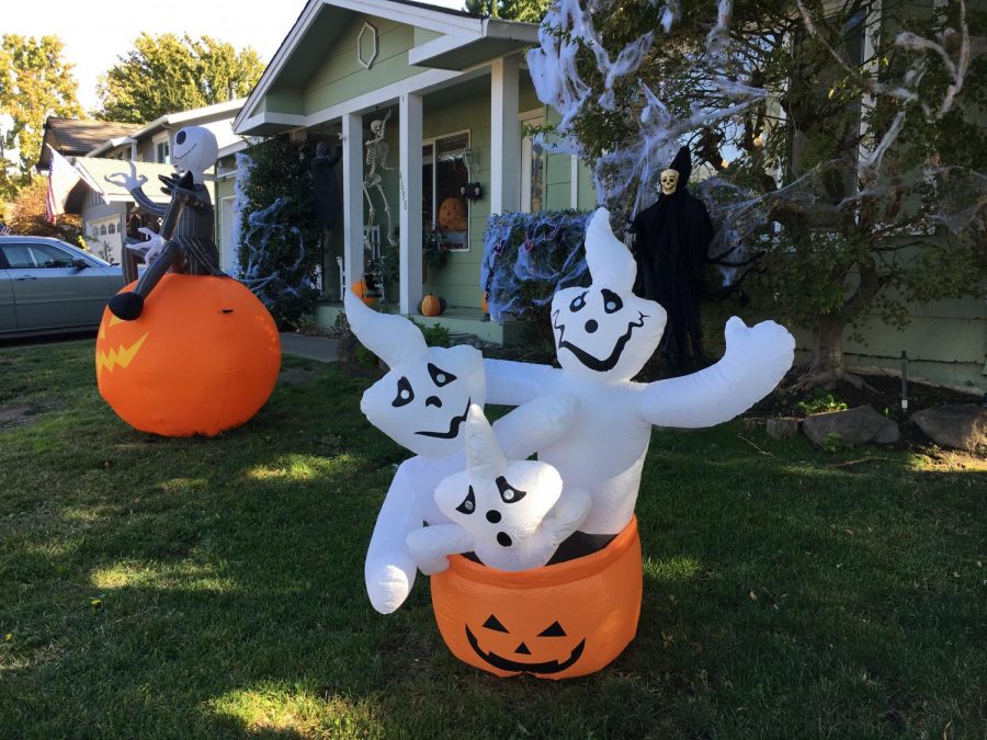 This house is haunted by everything you can imagine, from demonic pumpkins to adorable Casper-esque ghosts to the devilish hooded skeleton lurking in the distance.
