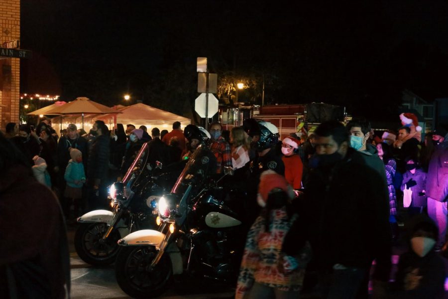 The police added their procession of motorbikes and cars to the parade. 