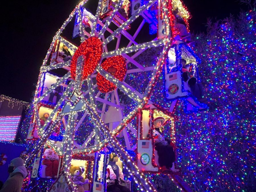 As you enter Deacon Daves, a 25 ft Ferris wheel sits in front of you. A huge bush covered with lights sits behind it.