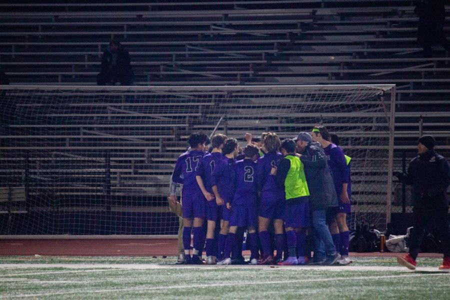 The team huddles together for a rallying cheer after a goal by Livermore.
