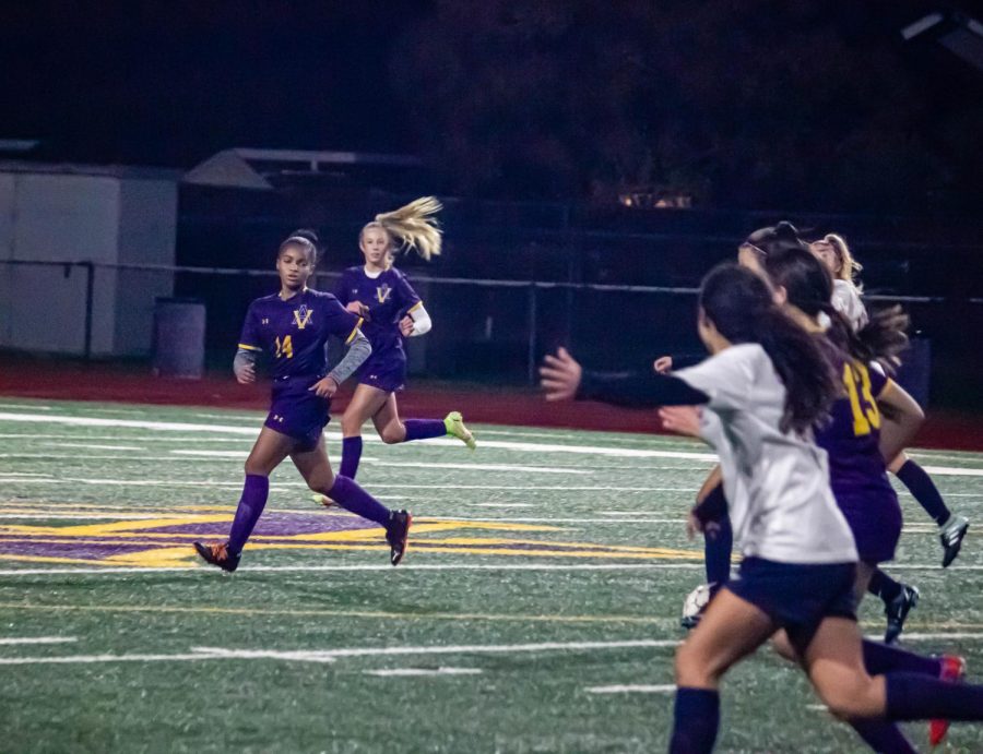 Ava Charles ('25) gets ready to receive a pass by her teammate.
