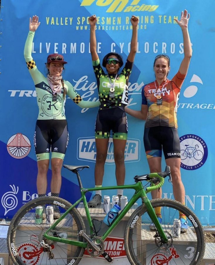 Shantelle stands with her other competitors at the finishing line podium.