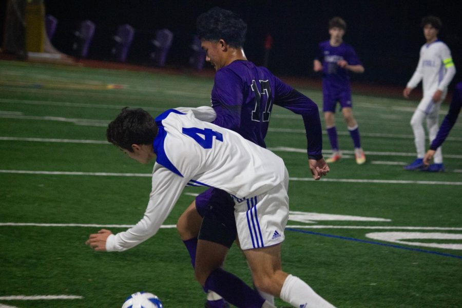 Devon Huynh ('23) jockeys to reach the ball before Foothill.