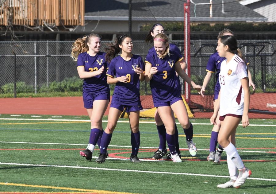 Amador players celebrate after a goal.