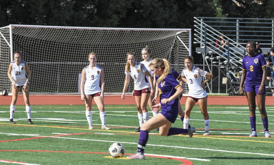 Maddie Benson ('22) takes a penalty shot and scores for Amador.