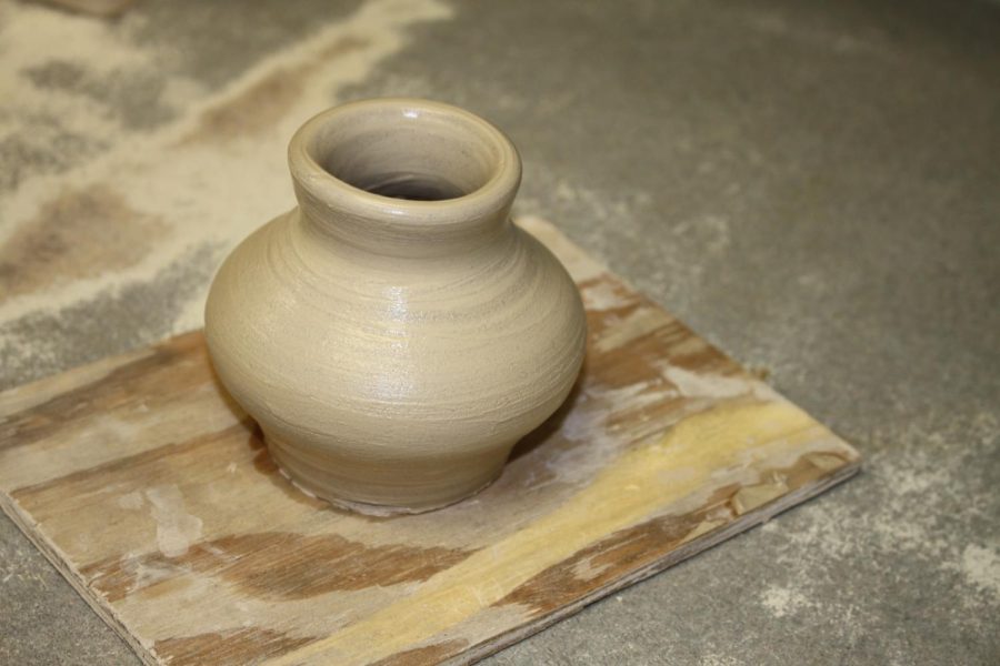 Sitting out to dry is a vase a ceramic student created on a throwing wheel.