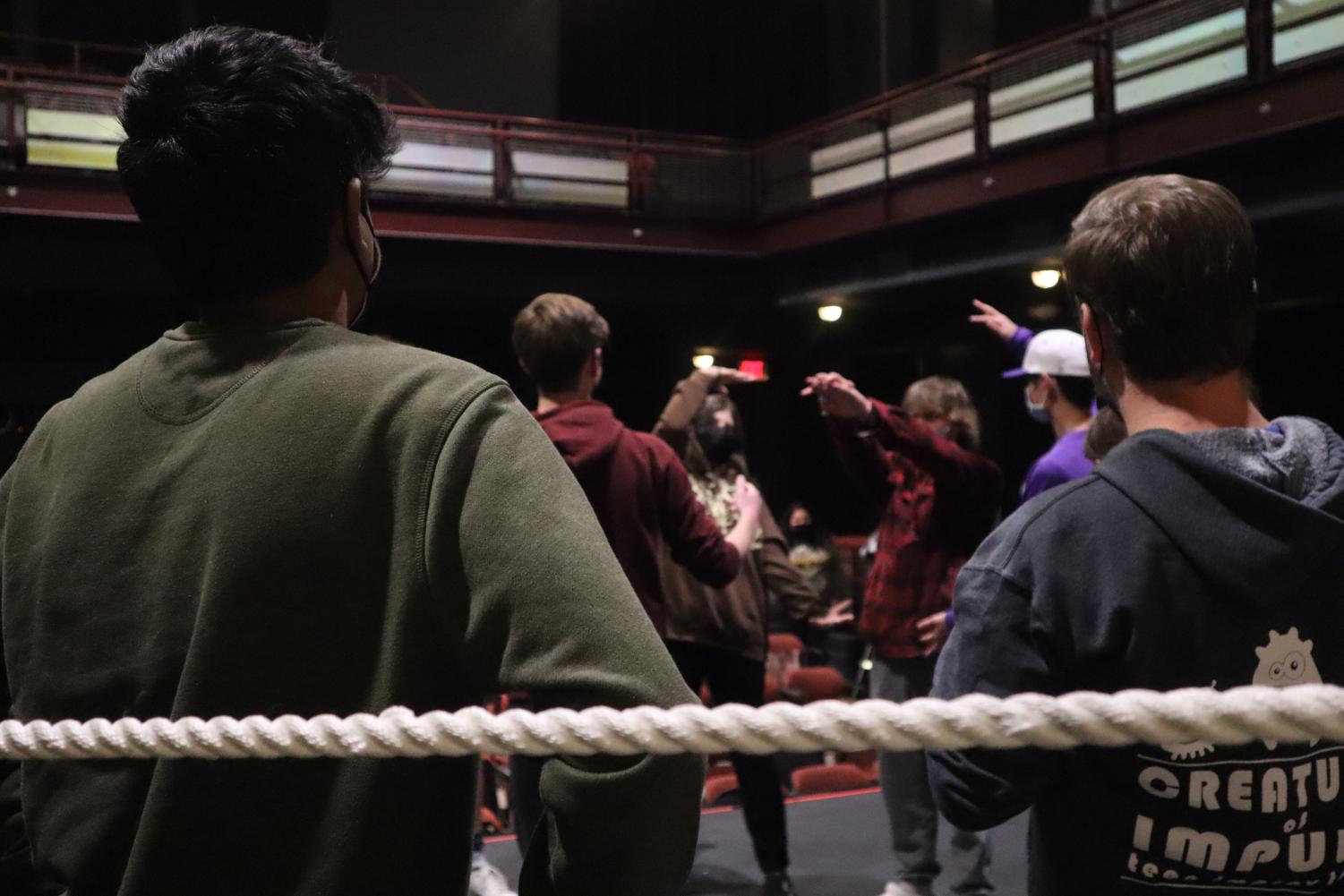 Mr. Amador performs with Creatures of Impulse in an improv battle
