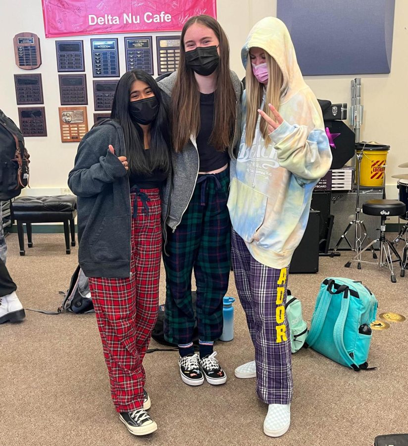 Sahithya Subraminiam (24), Julie Asturias (24), and Maddie Kostalnick (24) practice self love by wearing PJs to school.