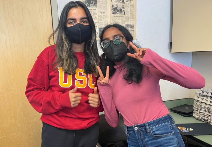 Ritika Gupta ('24) and Soumya Rangan ('23) wear pink and red to show their love for AV staff.