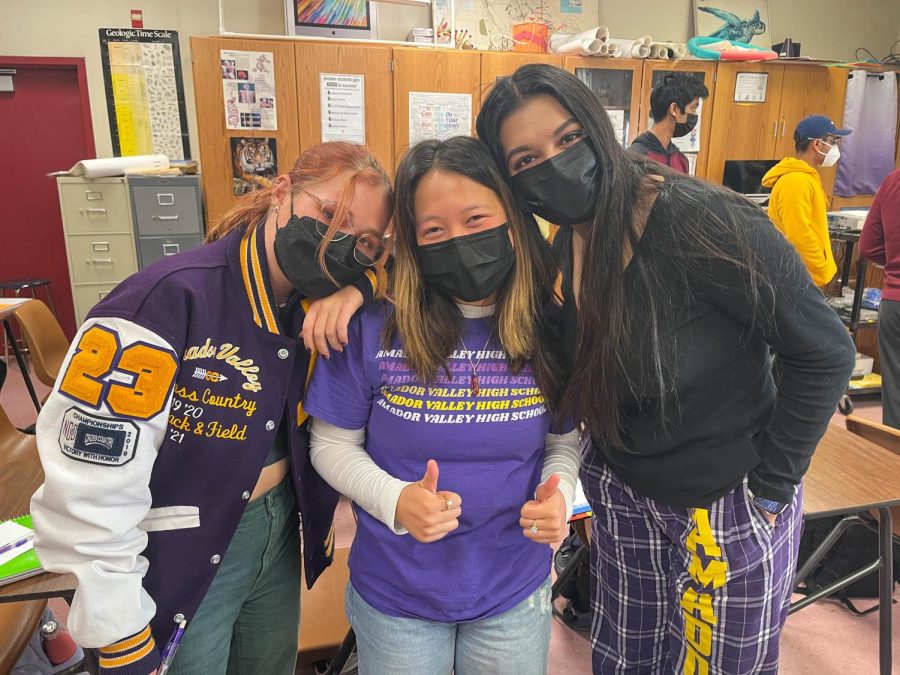 Dahlia Versteeg (23), Aubrey Tran (23) and Saniya Vaidya (23) wear purple and gold for Don Deckout Day.