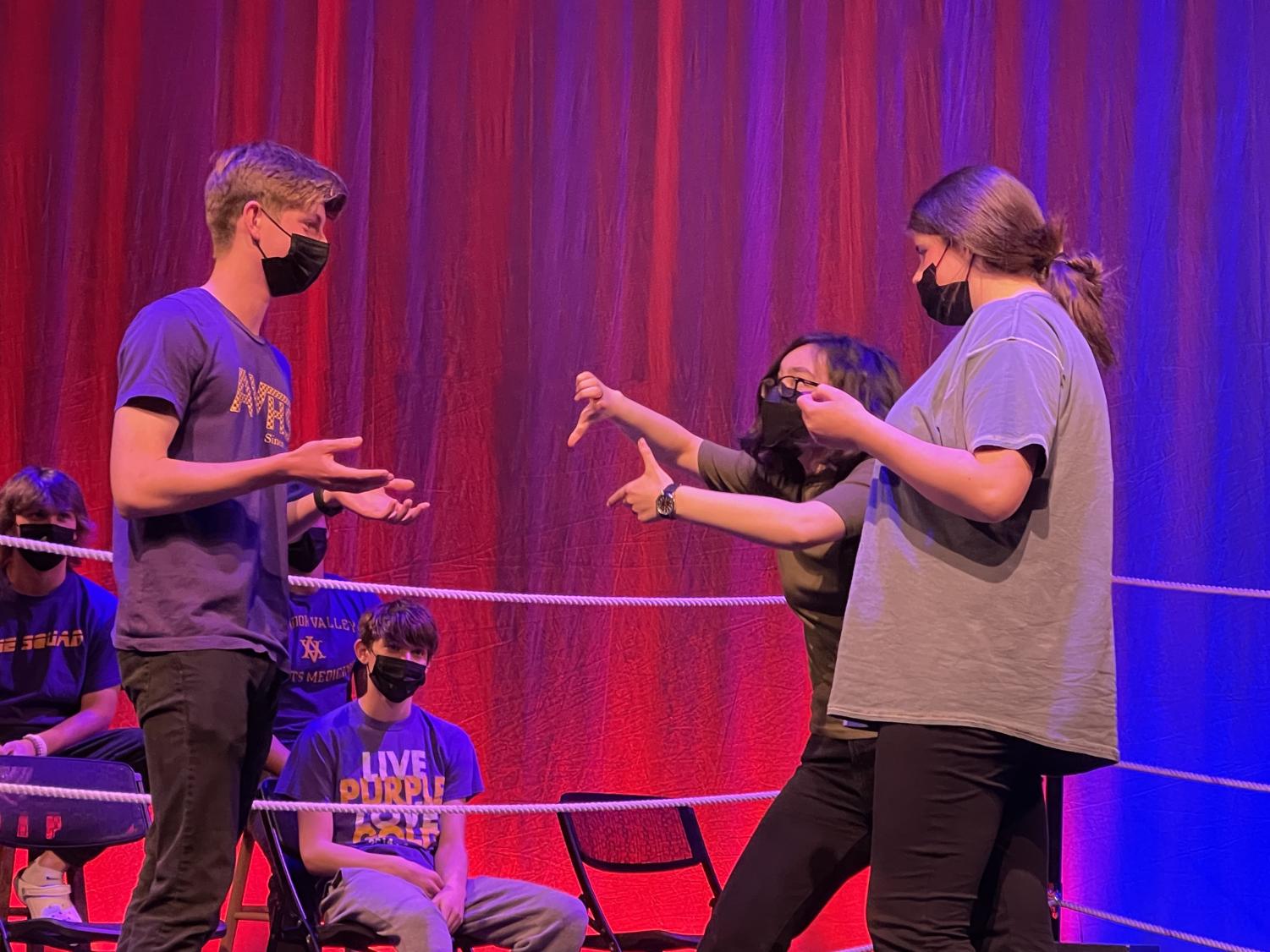 Mr. Amador performs with Creatures of Impulse in an improv battle