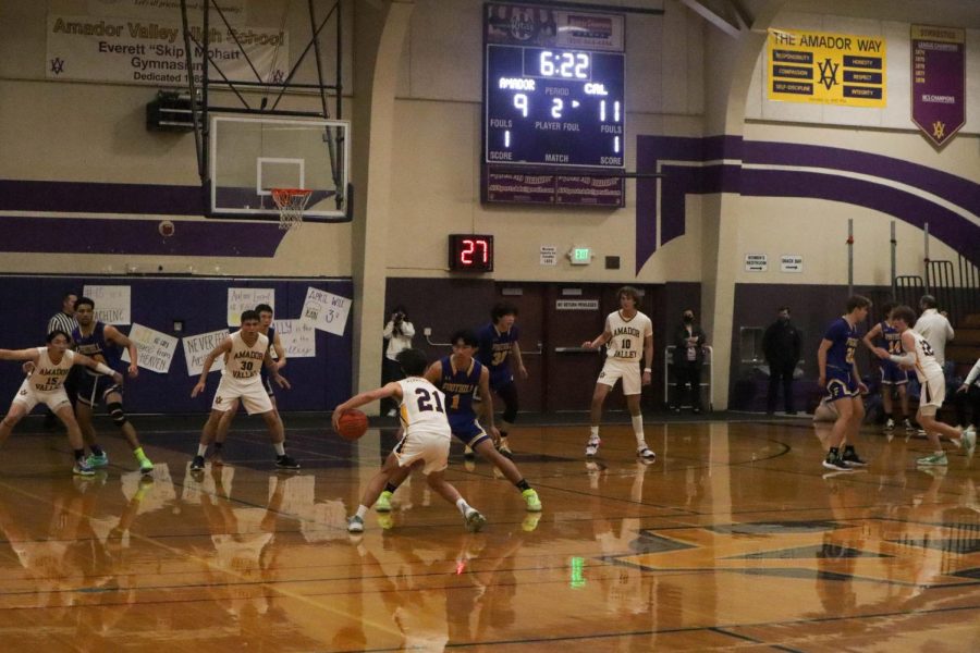 The team focuses on getting past Foothill's defenses in hopes of scoring a point. 