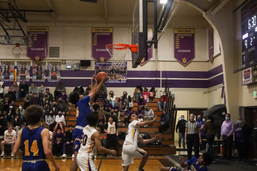 A heavily guarded foothill player; the Amador Basketball team didn't go down without a fight.