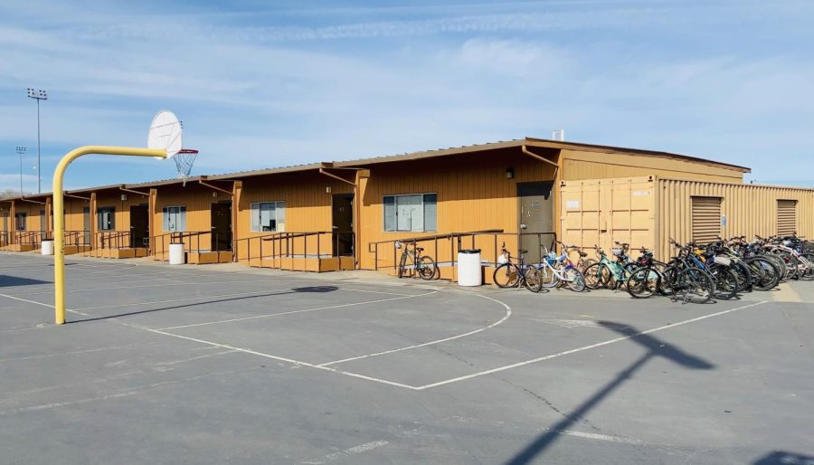The portable buildings lining the basketball courts will no longer be necessary due to the increased classroom space kindled by construction of the new building. 