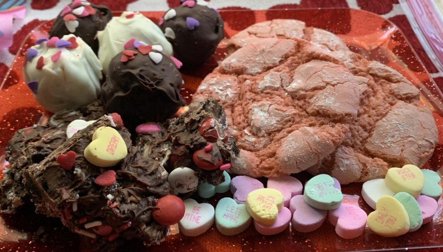 Try these three cute Valentine's Day treats: pink crinkle cookies, Valentine’s cookie bark, and red velvet truffles.