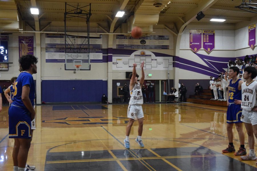 Tyler Chang ('23) shoots his free throw. 