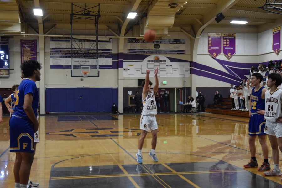 Tyler Chang (23) shoots his free throw. 